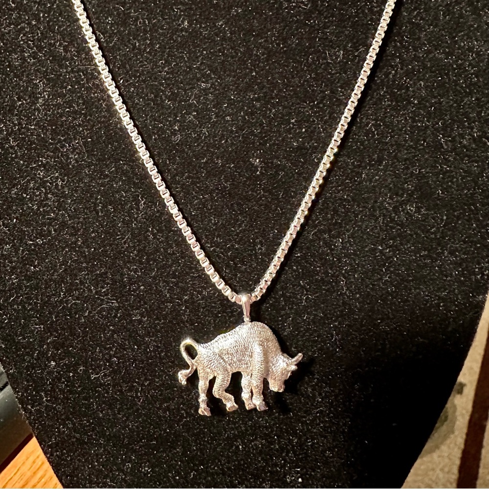 Silver tone bull on silver tone 8 inch chain. Great gift for a Taurus
